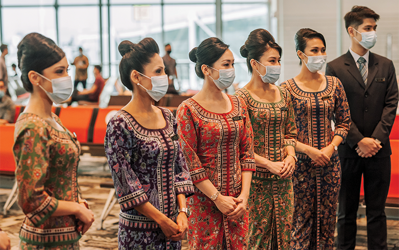 SIA cabin crew stand ready to welcome diners on board Restaurant A380 @Changi in October 2020. Courtesy of Singapore Airlines.